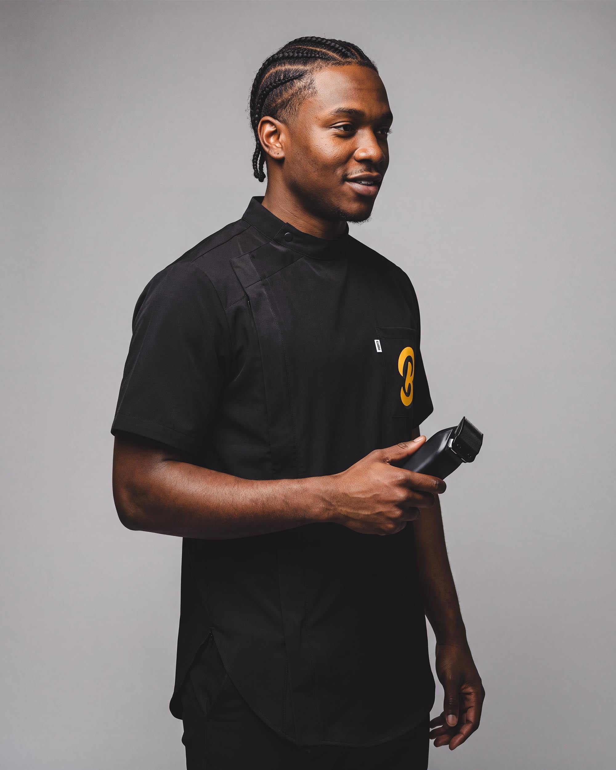 That Buttersoft Scoop Bottom Barber Smock - front